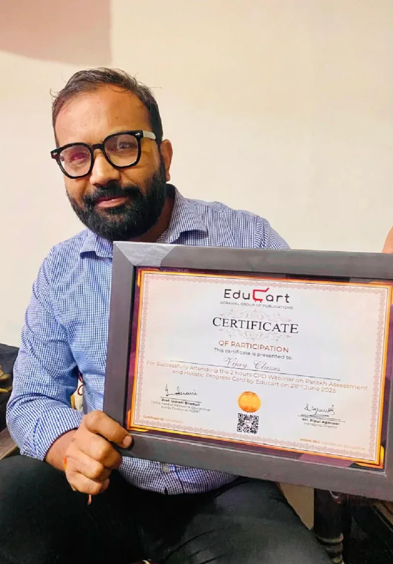 Vijay Kishor Tiwari holding his EduCart certificate of participation for the CPD webinar on PARAKH assessment, June 2025