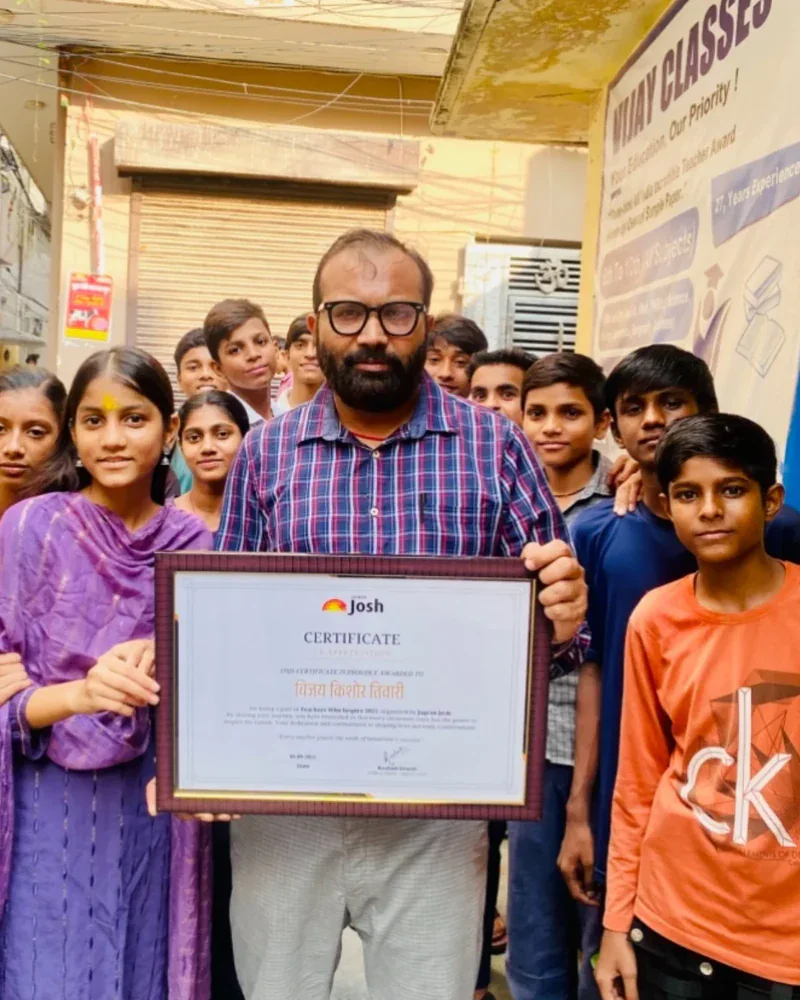 Vijay Kishor Tiwari with his students outside Vijay Classes, Janakpuri, New Delhi